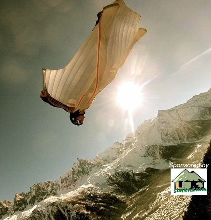 Wingsuit flyer over the Simien cliffs