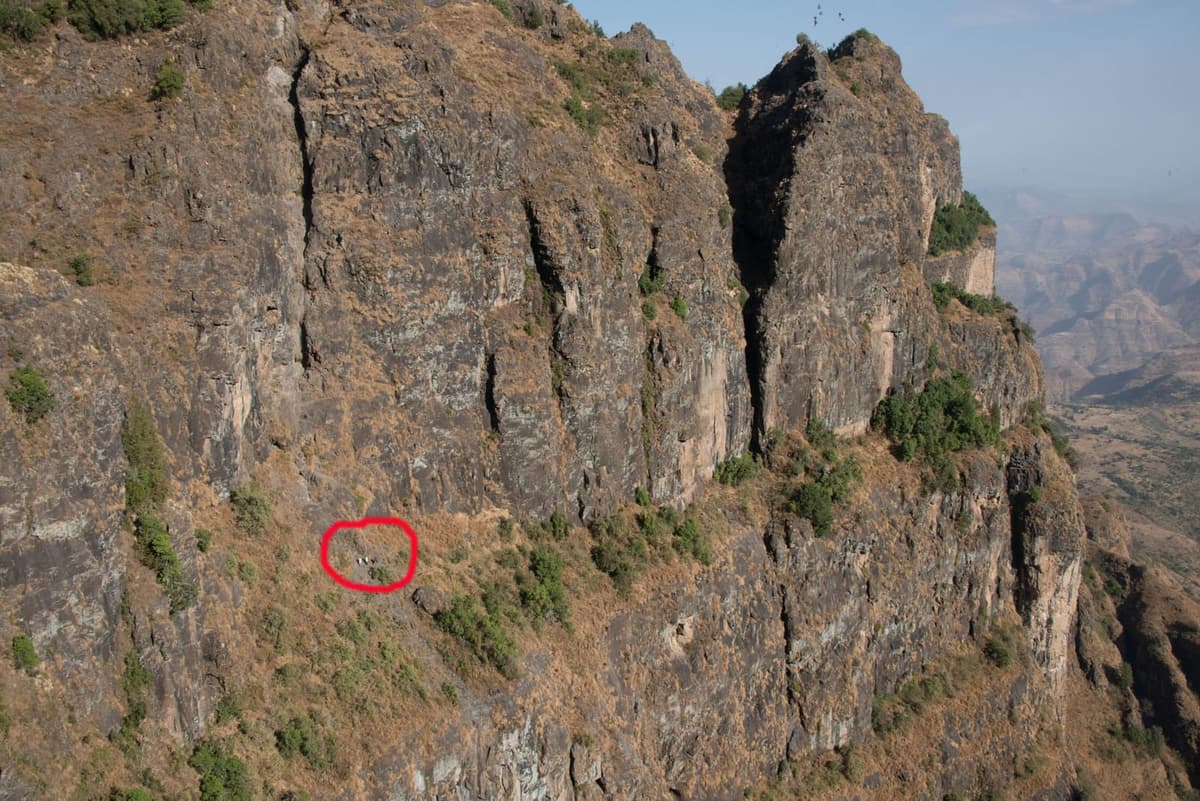Cliff face with the path to Saddique Amba monastery circled