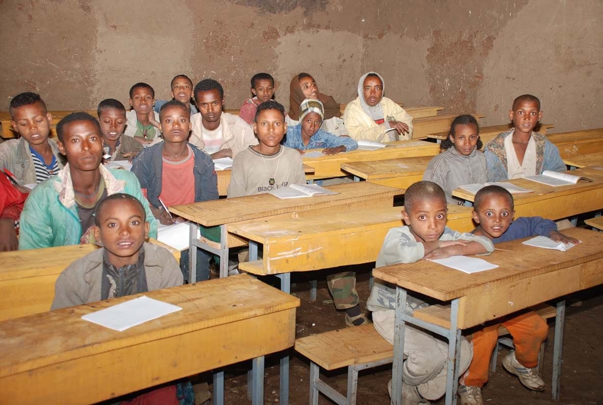 Pupils at new school desks