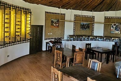 Round dining room laid for dinner