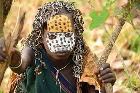 Child with a painted face in southern Ethiopia