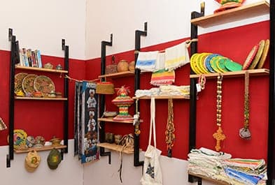 Community shop shelves with local crafts